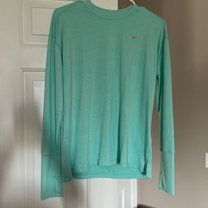 Nike Dri fit long sleeve size medium. Teal blue.